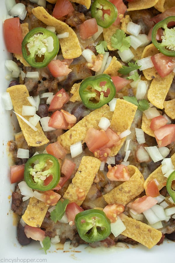 Closeup of Frito Pie Casserole with toppings