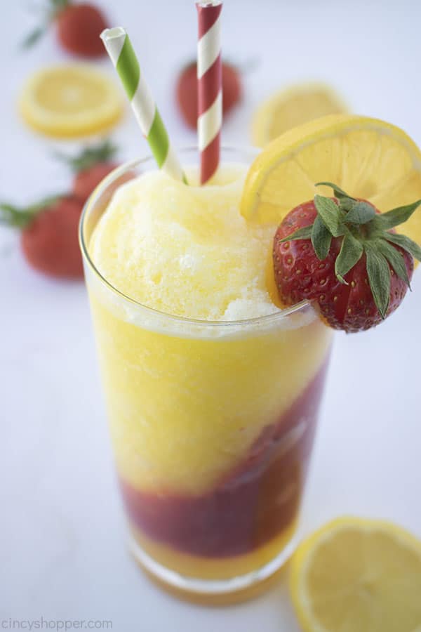 Tall glass of frozen lemonade with strawberries