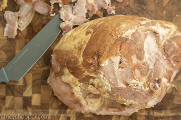 Removing rind from baked ham
