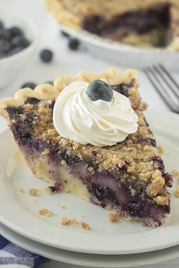 Creamy Blueberry Pie with Crumble Topping on a plate