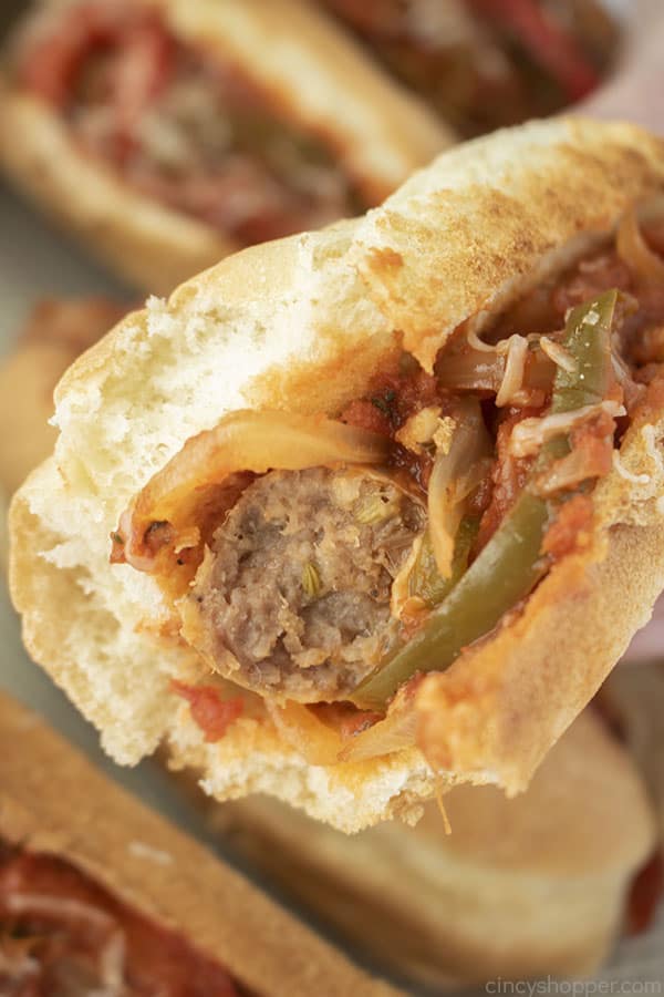 Sausage with peppers and onions on a hoagie roll