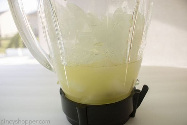 Lemon juice, sugar, and ice in blender