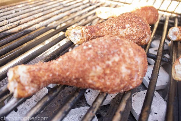 Seasoned chicken on grill