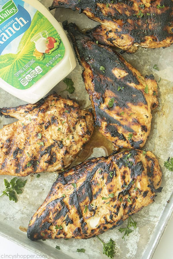 Grilled Ranch Chicken on a pan with dressing