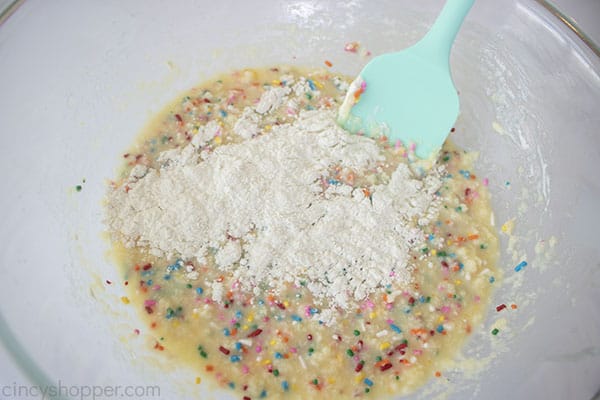 Dry ingredients added to cupcake batter