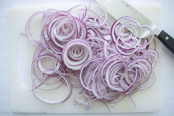 Thin sliced red onions