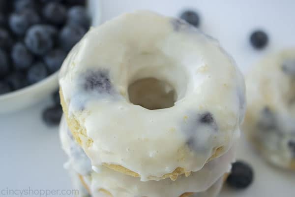Baked donuts with blueberry and glaze