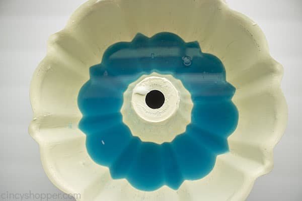 Blue jello added to mold