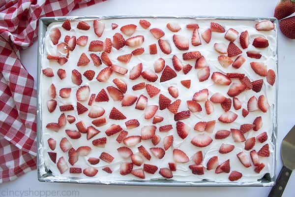 Diced strawberries added to cake