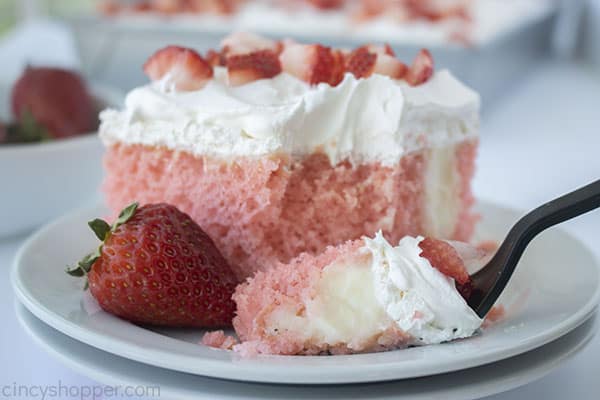 Strawberry Cake with cheesecake pudding on a fork