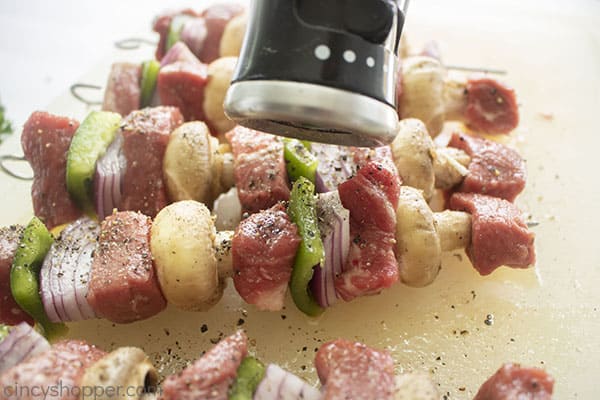 Salt and pepper added to steak kebabs 