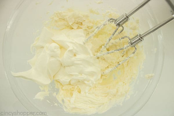 Cream cheese and sour cream in a bowl