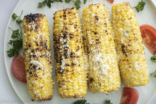 Seasoned corn on the cob grilled