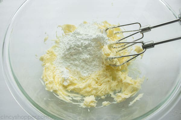 Powdered sugar added to creamed butter