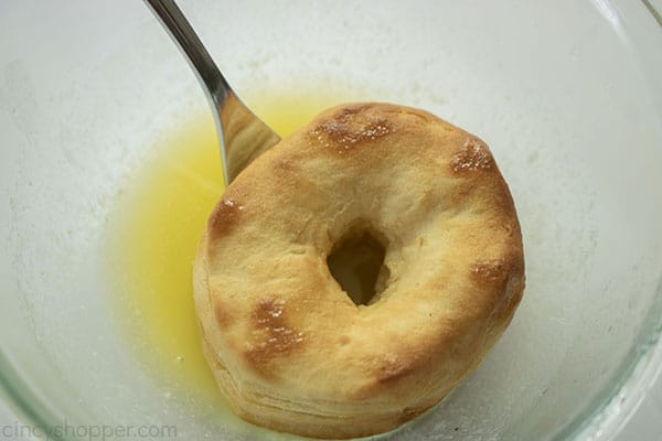 Air fried donut dipped in butter