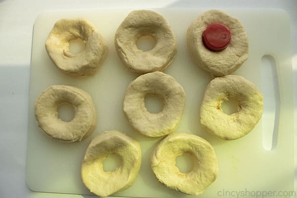 Cap to cutout donut hole in biscuits