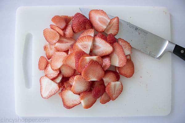Sliced Strawberries on a cutting board