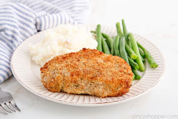 Breaded pork chop on a plate