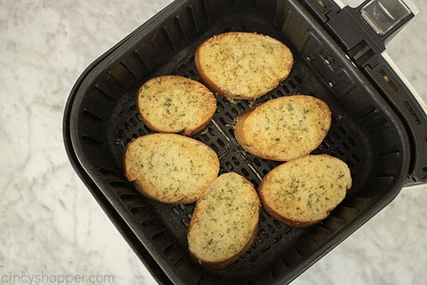 Air Fried garlic bread slices in fryer