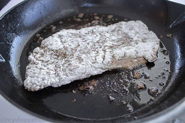 Dredged Cube Steak in a pan