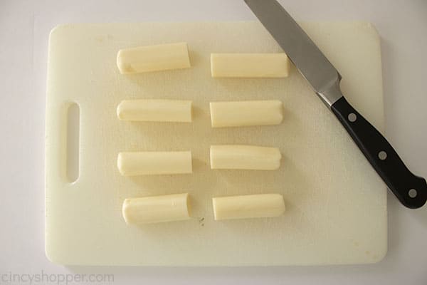 String cheese cut in half