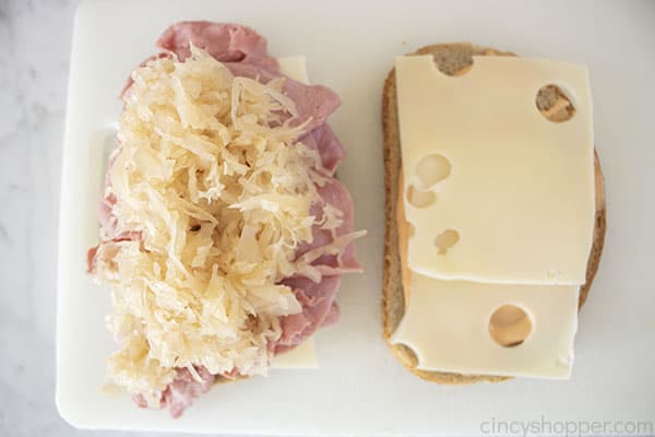 Adding kraut to sandwich