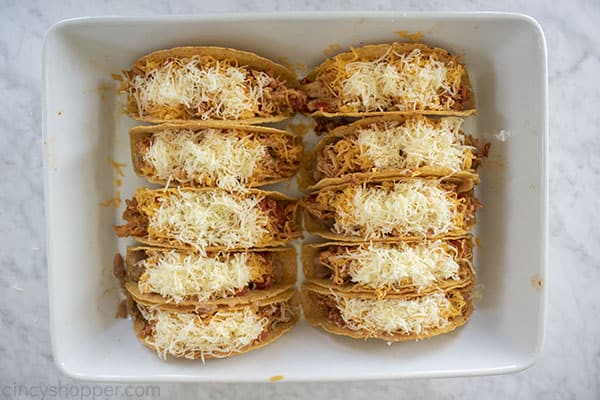 Cheese added to taco shells