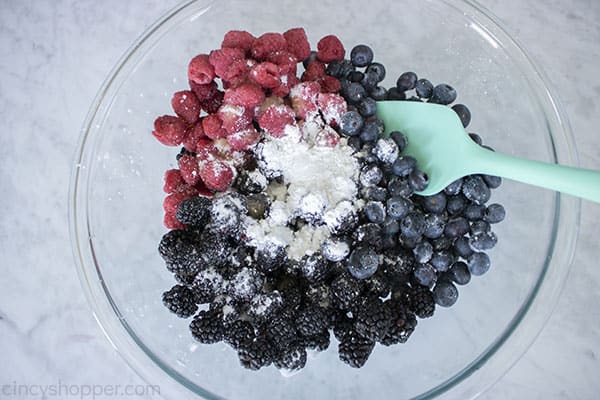 Berries in a bowl with cornstarch, sugar, vanilla