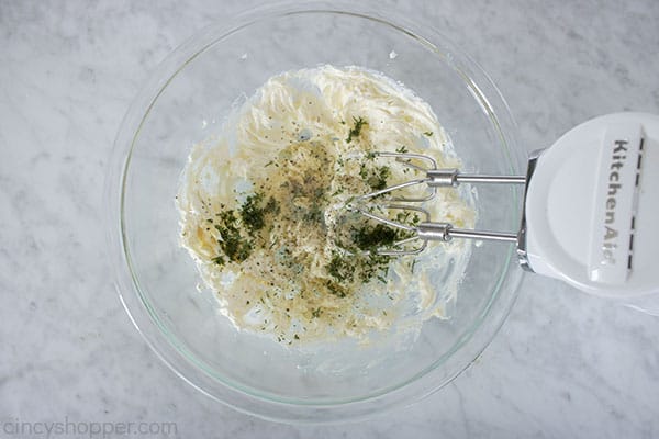 Spices added to cream cheese spread for sandwiches