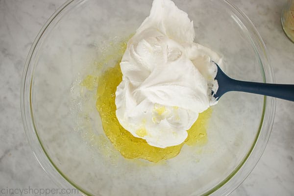 Pineapple Jello and Cool Whip in a bowl