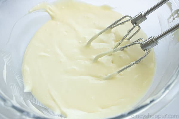 Beaten cream cheese mixture for cake in a bowl