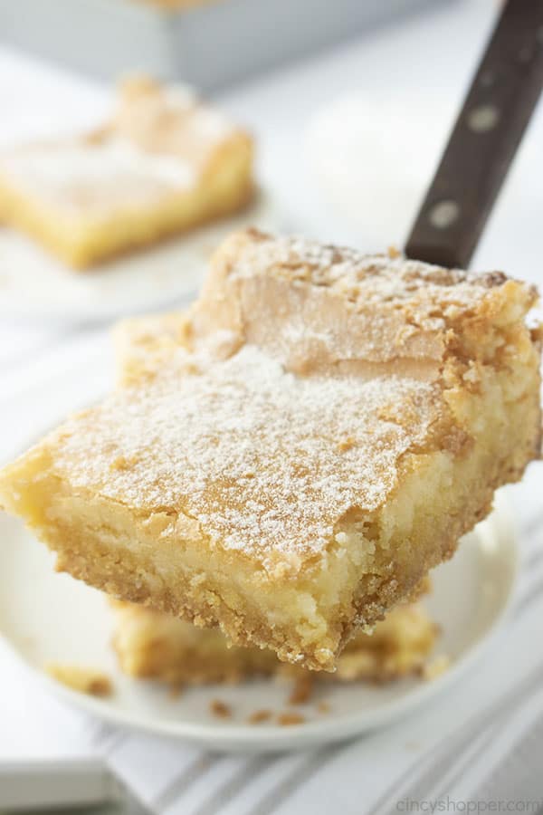 Ooey Gooey Butter Cake on a spatula 