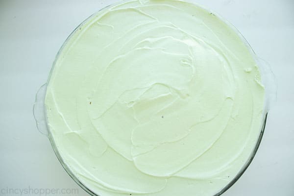 Mint pie filling added to Oreo crust