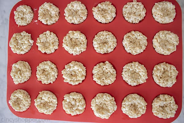 Mini Rice Krispie Treat nests in muffin dish