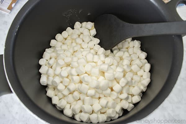 Marshmallows added to melted butter