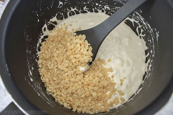 Rice Krispie cereal added to melted marshmallows
