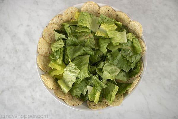 More corn chips added to taco salad