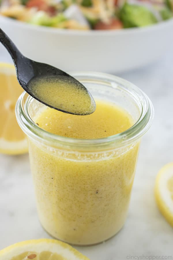 Lemon dressing on a spoon