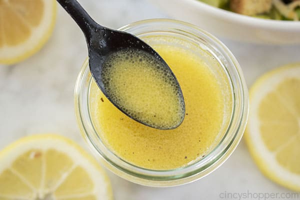 Lemon dressing on a spoon