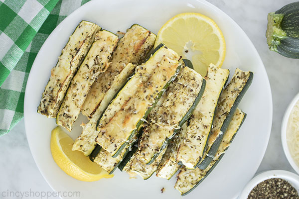 Spears of cooked zucchini on a plate