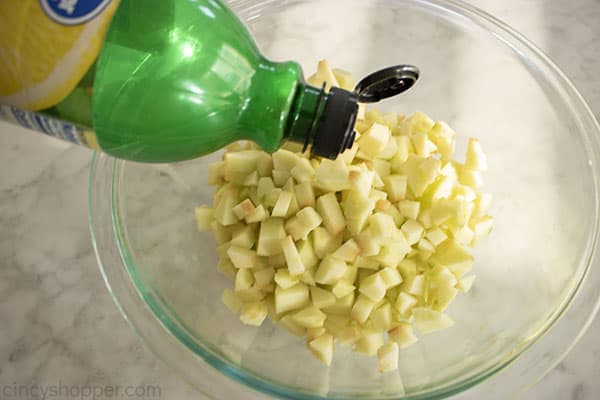 Lemon juice added to diced apples