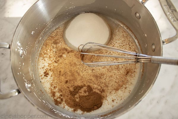 Sugar, cinnamon and nutmeg added to cornstarch mixture