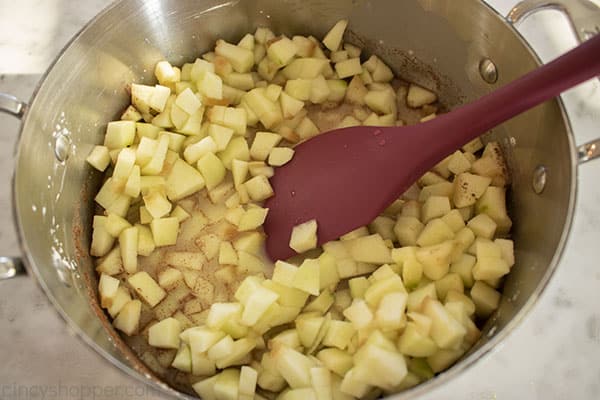 Diced apples added to mixture