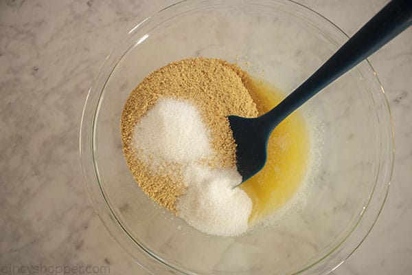 Graham cracker Crumbs and Sugar added to melted butter