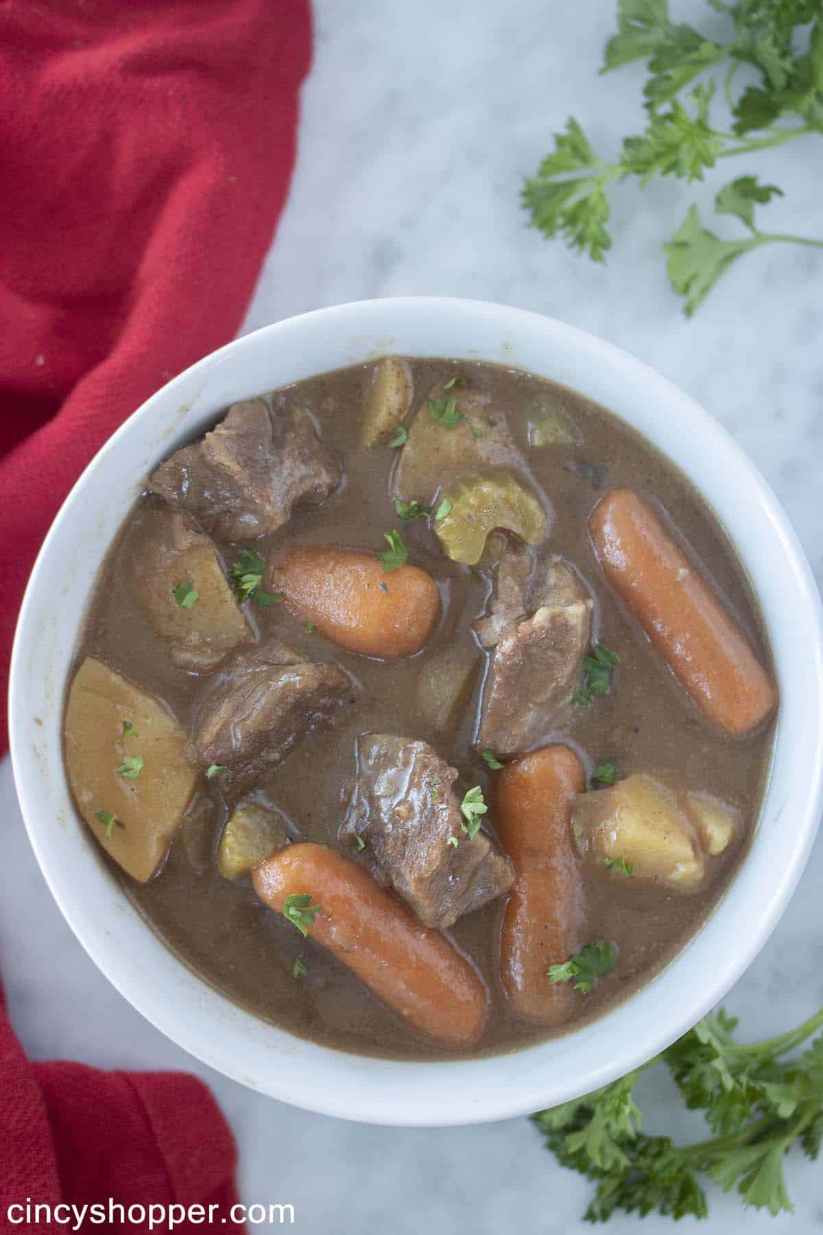 White bowl with beef stew.