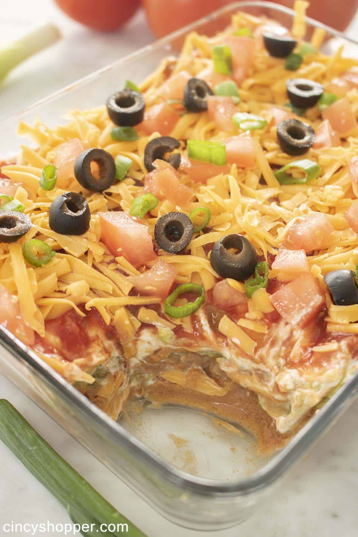 Showing layers of seven layer dip.