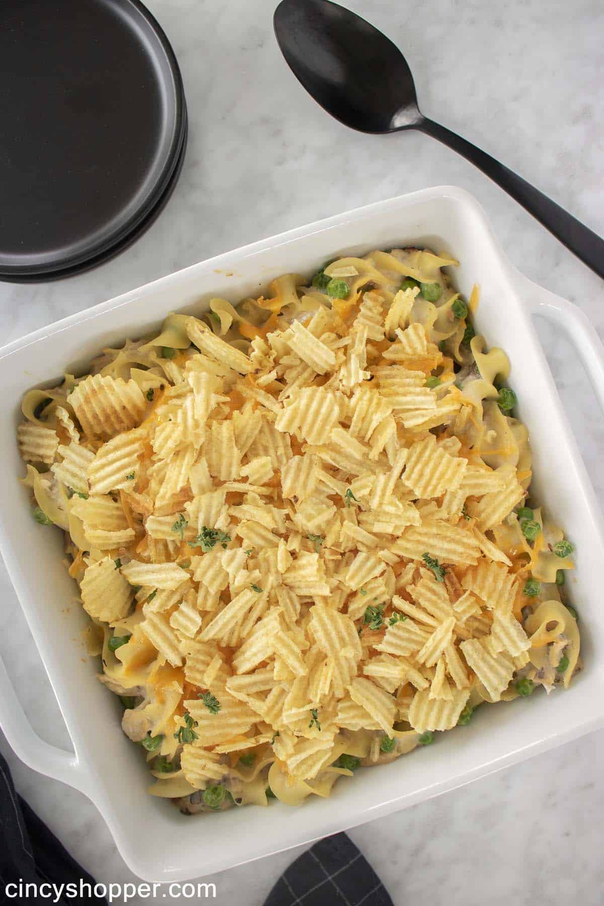 Easy Tuna Noodle Casserole with potato chips in a dish.
