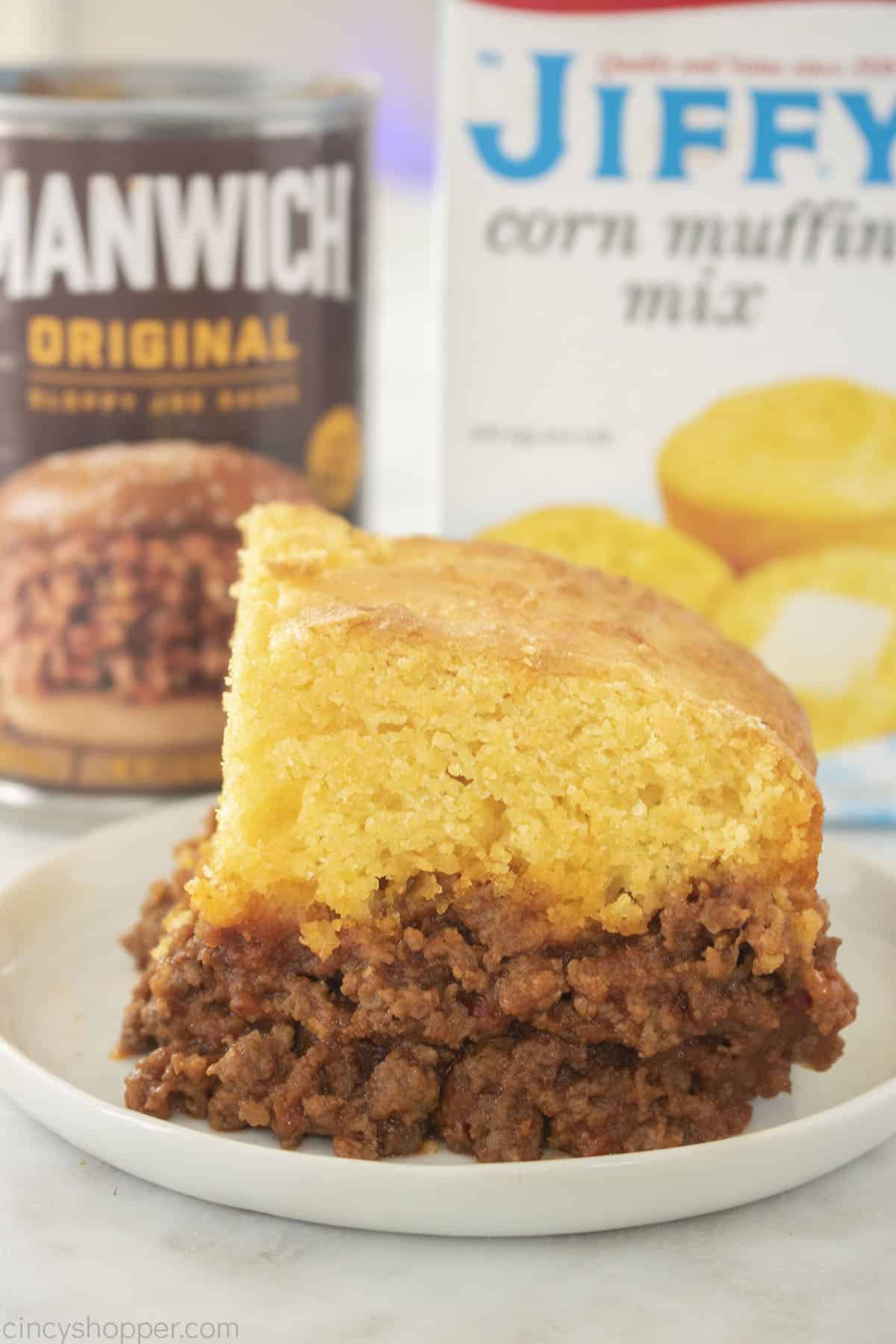 Sloppy Joe Cornbread Casserole on a plate with Manwich and Jiffy.