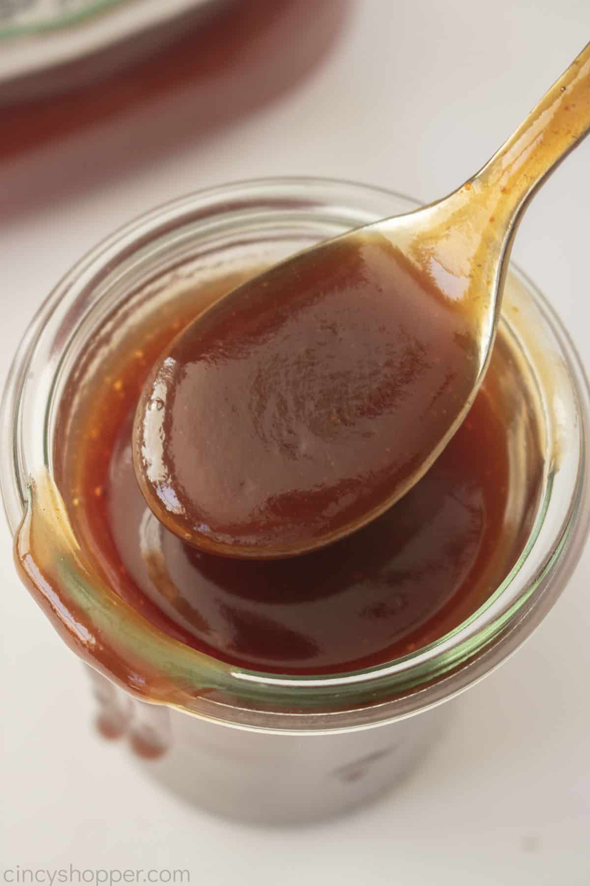 Three ingredient barbecue sauce ona spoon.