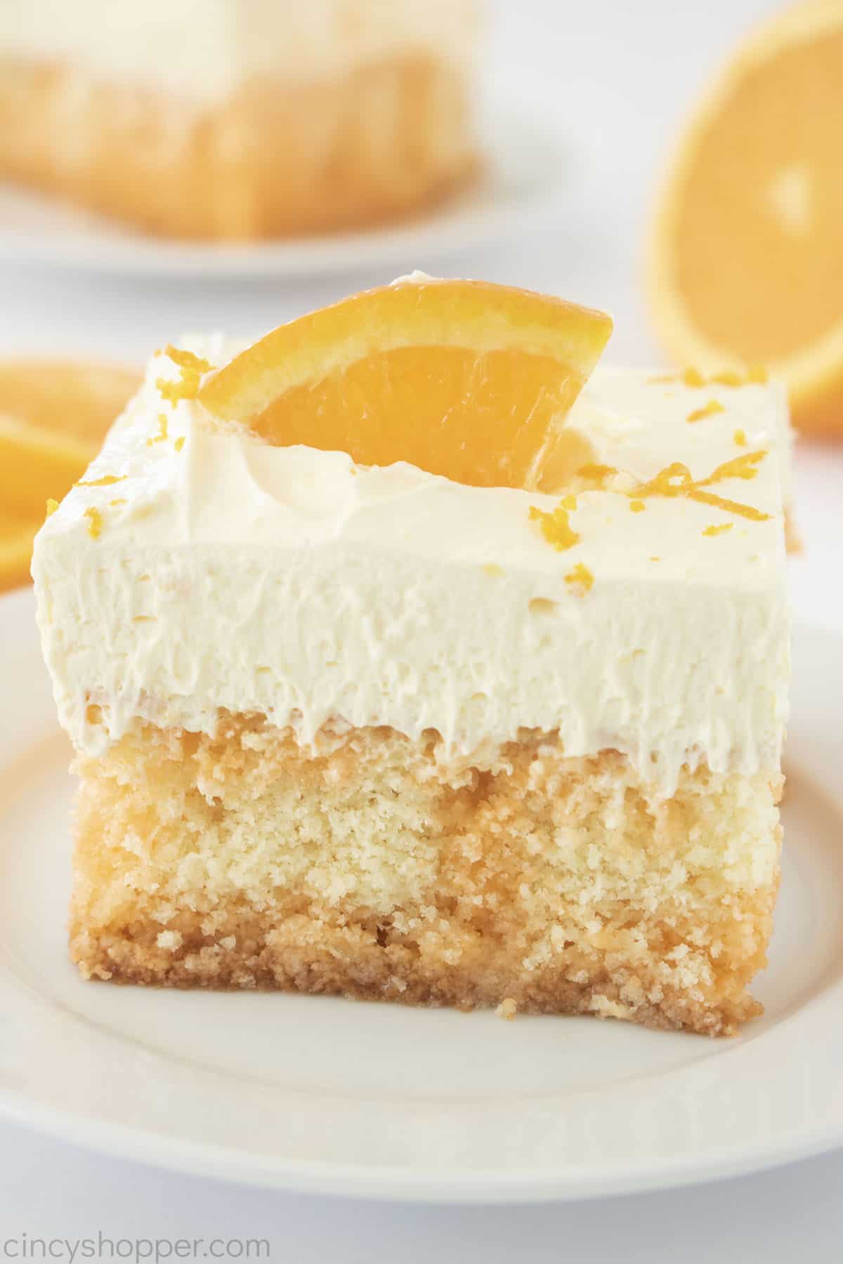 Orange Creamsicle Cake on a plate.